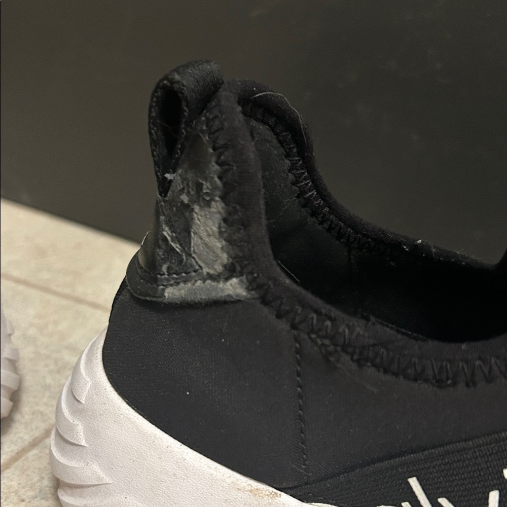 Calvin Klein Black and White Slip-On Shoes - Picture 2 of 3